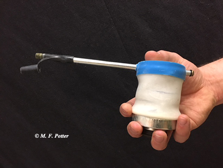 Dust insecticides are easy to apply with a bellows duster.